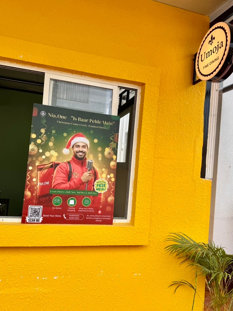 A Nia community event poster displayed at the Umojia dining space