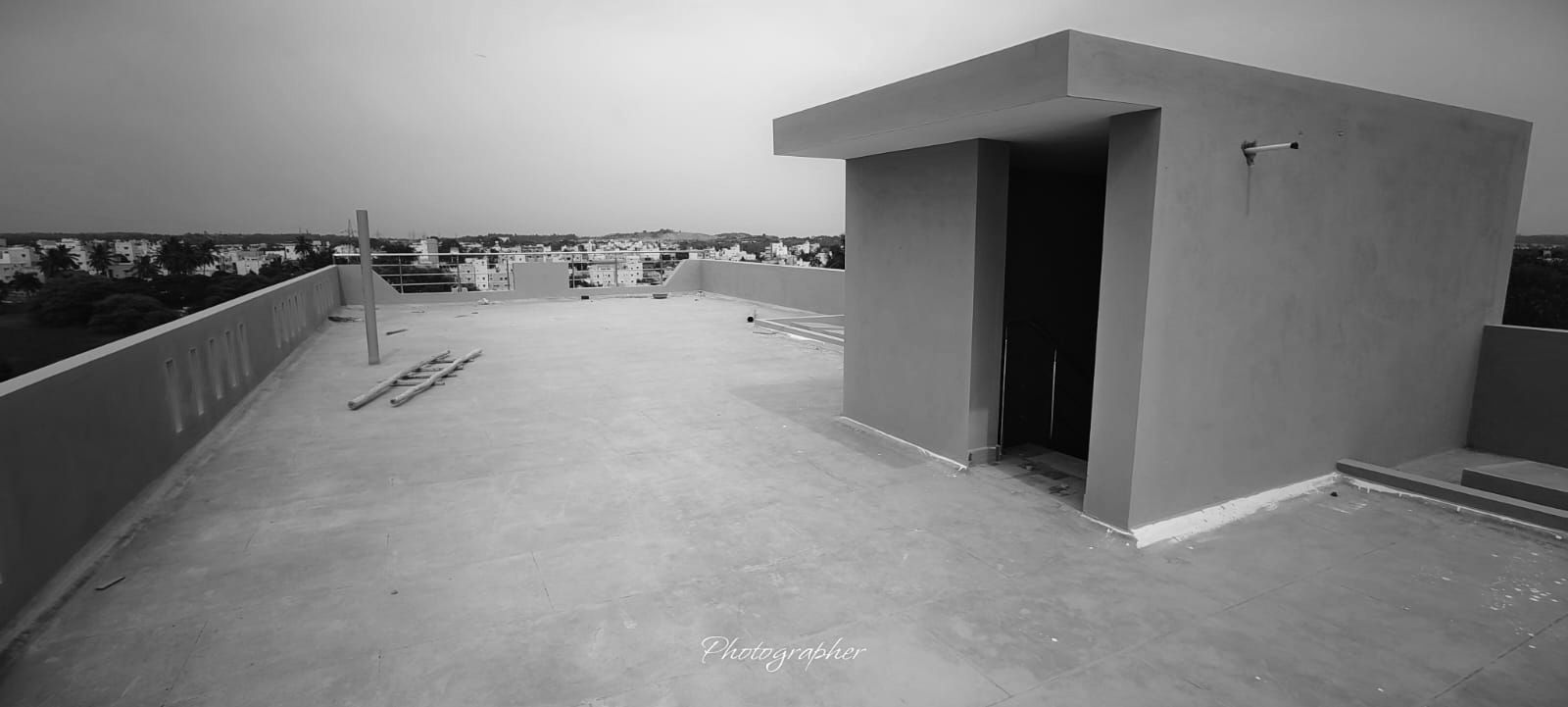 The finished rooftop terrace of a Nia residence in Hosur, overlooking the low-rise cityscape of the Bangalore–Hosur corridor
