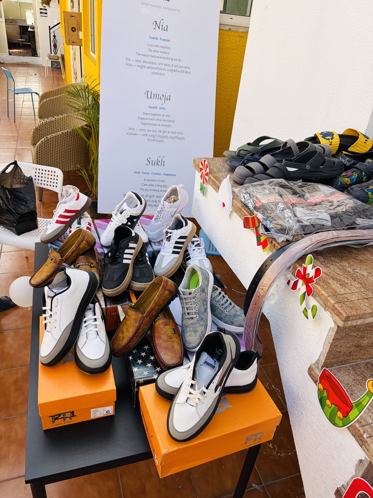Footwear displayed for members at a Nia marketplace event